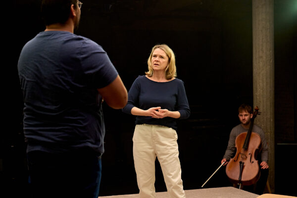 Irfan Shamji (Ash), Lucy Black (Jane) and Cellist Colin Alexander in 'The Cord' at Bush Theatre. Photo by Manuel Harlan.
