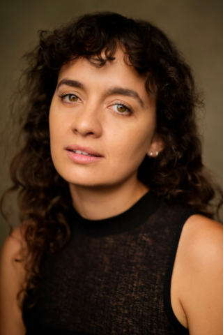 Headshot of Nadi Kemp-Sayfi.