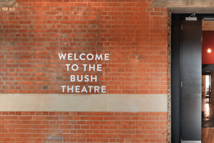 exterior wall of bush theatre that reads 'welcome to the bush theatre' painted on the wall.