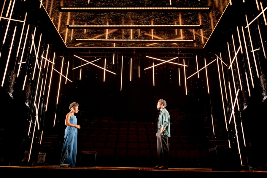 Two actors on stage in a performance of Shifters.