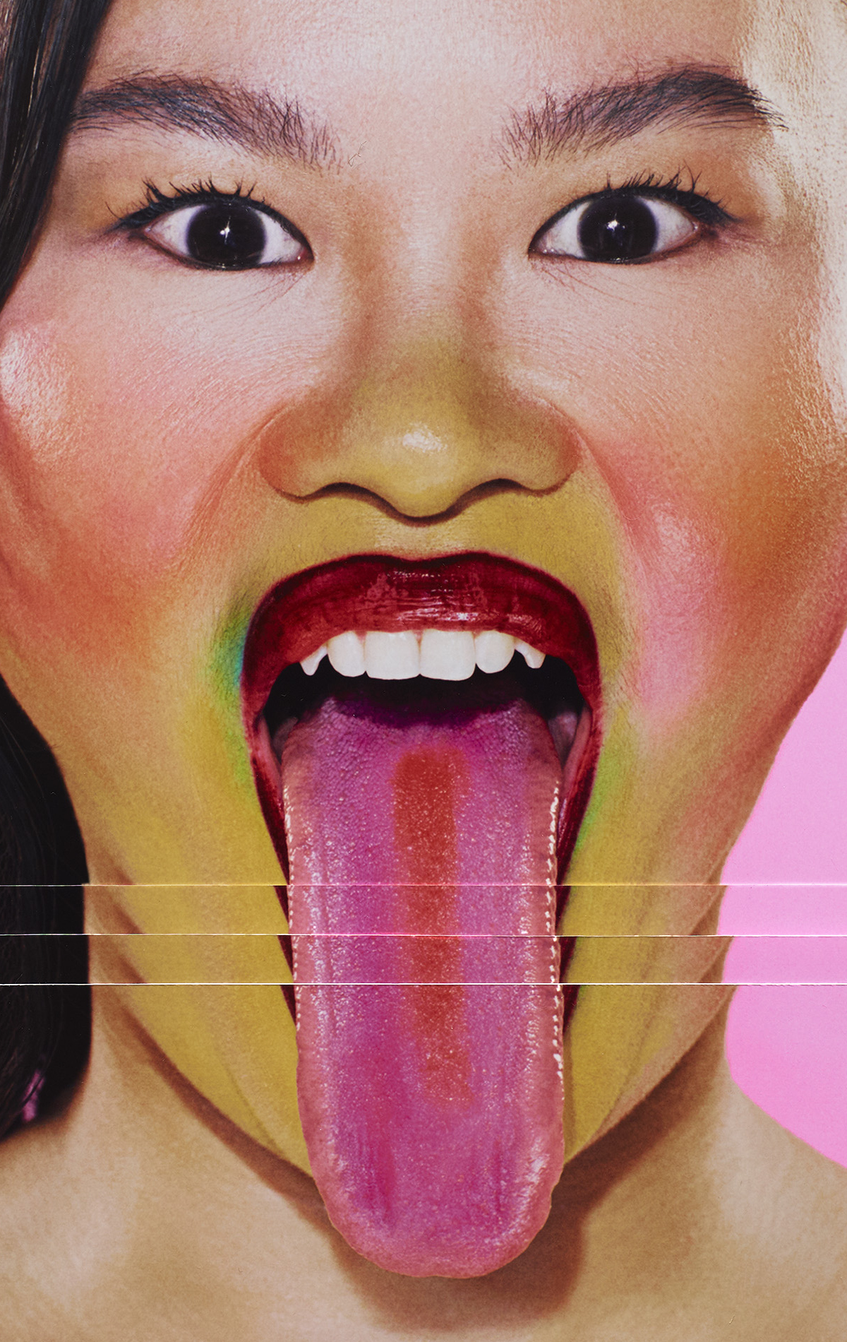 An east Asian woman looks directly at the camera with her tongue out. The image is sliced and repeated so her tongue appears really long.